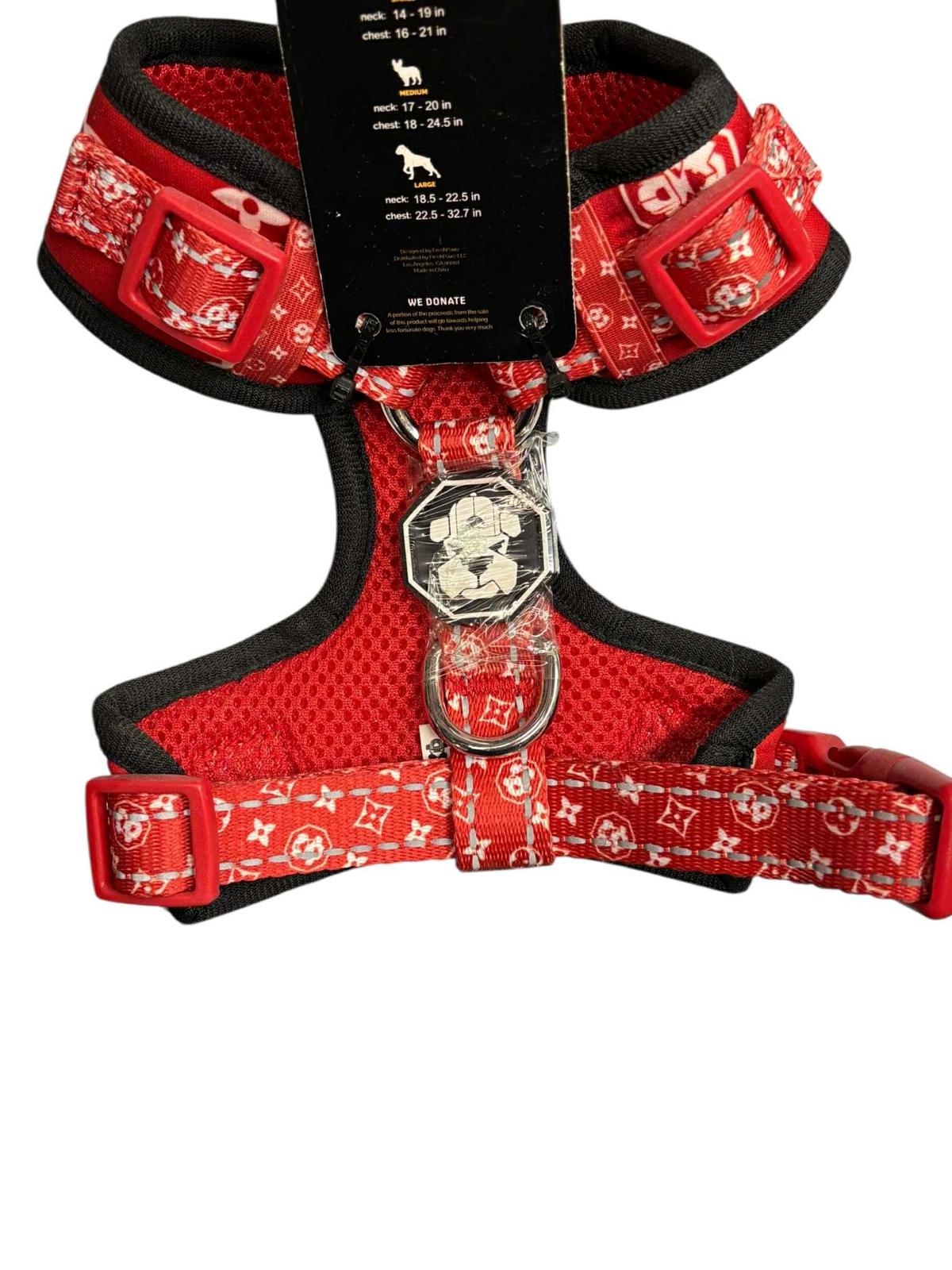 Red Dog Harness featuring a stylish pattern and adjustable straps for comfort.