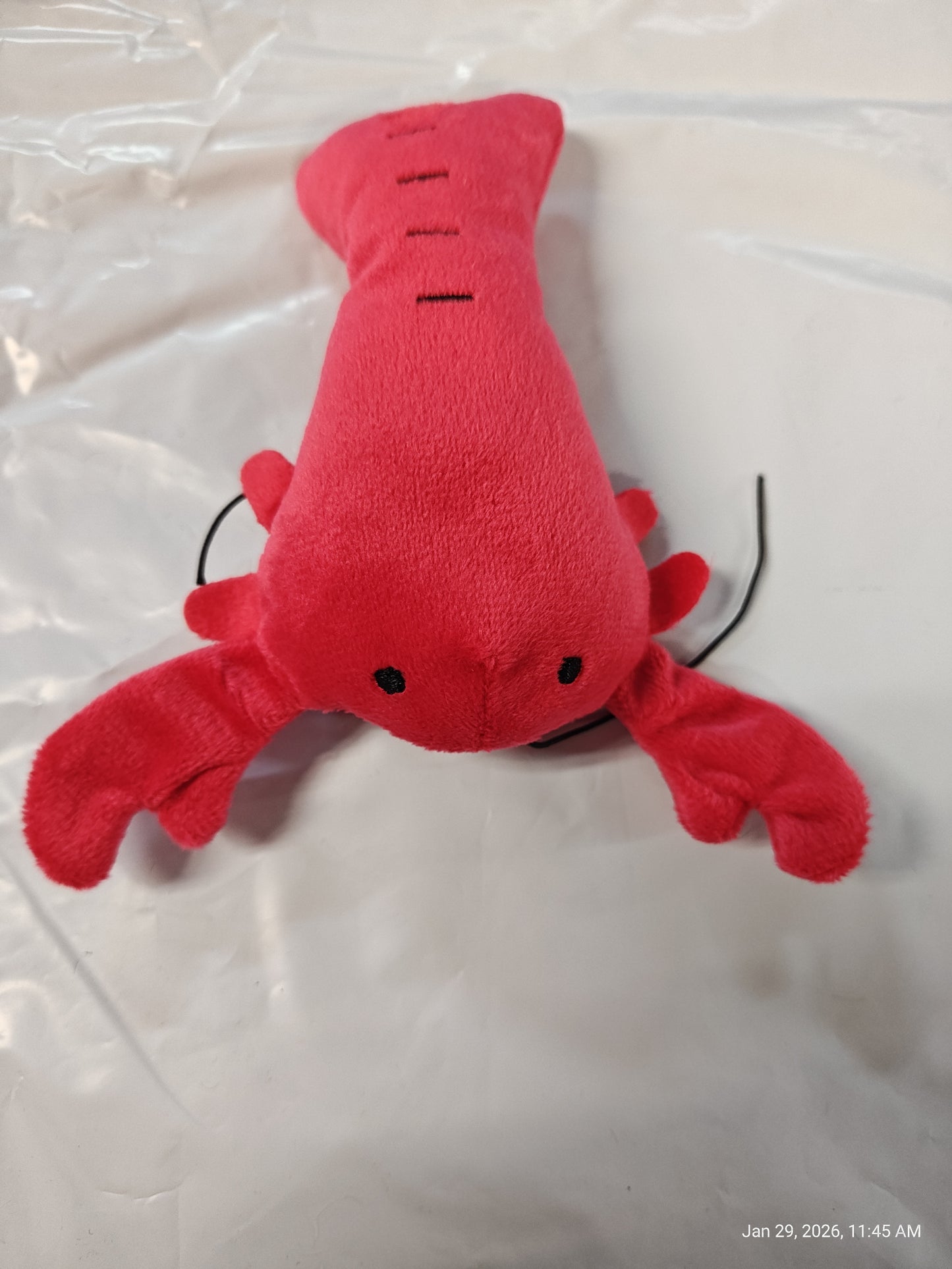 Red Lobster Plush Toy with detailed claws and eyes.
