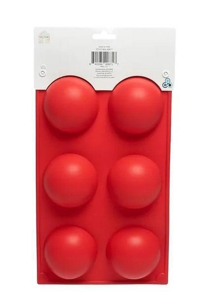 Red silicone mold for making six round cake pops.