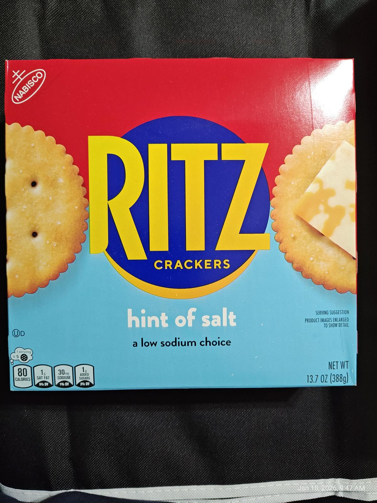 Ritz Crackers hint of salt box featuring low sodium choice with yellow and blue design.