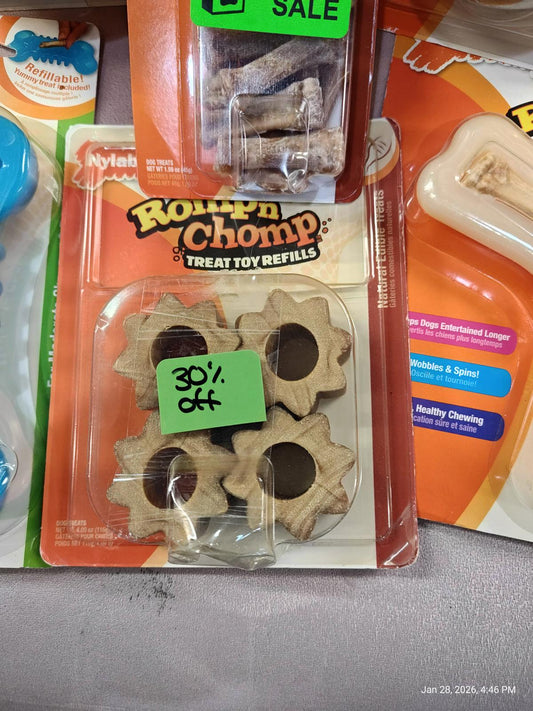 Rompin Chomp treat toy refills featuring star-shaped snacks with a dark center, 30% off sale.