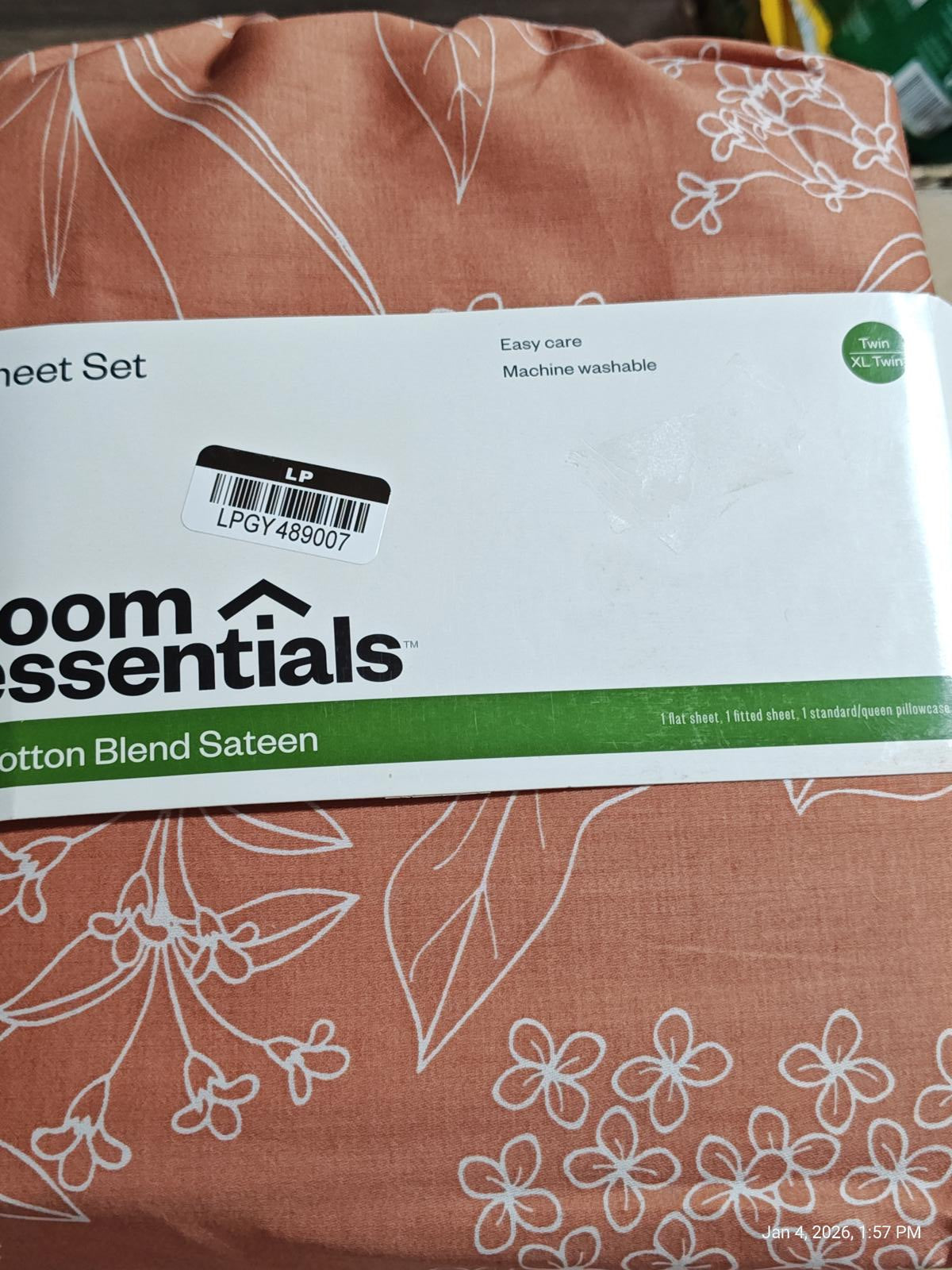 Room Essentials cotton blend sateen sheet set featuring a floral design in soft peach color.
