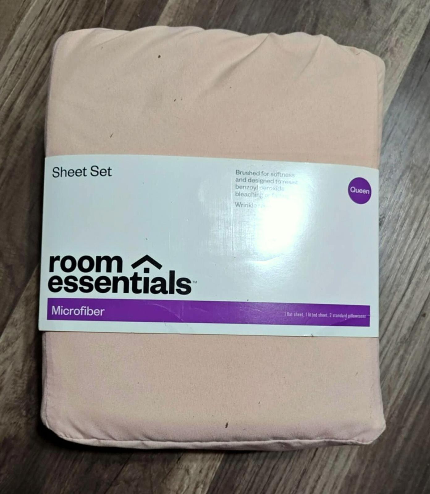 Room Essentials Microfiber sheet set in peach color, neatly packaged.