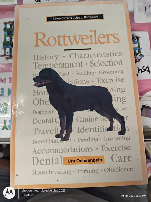 Rottweilers book cover featuring a black Rottweiler illustration and informative text.