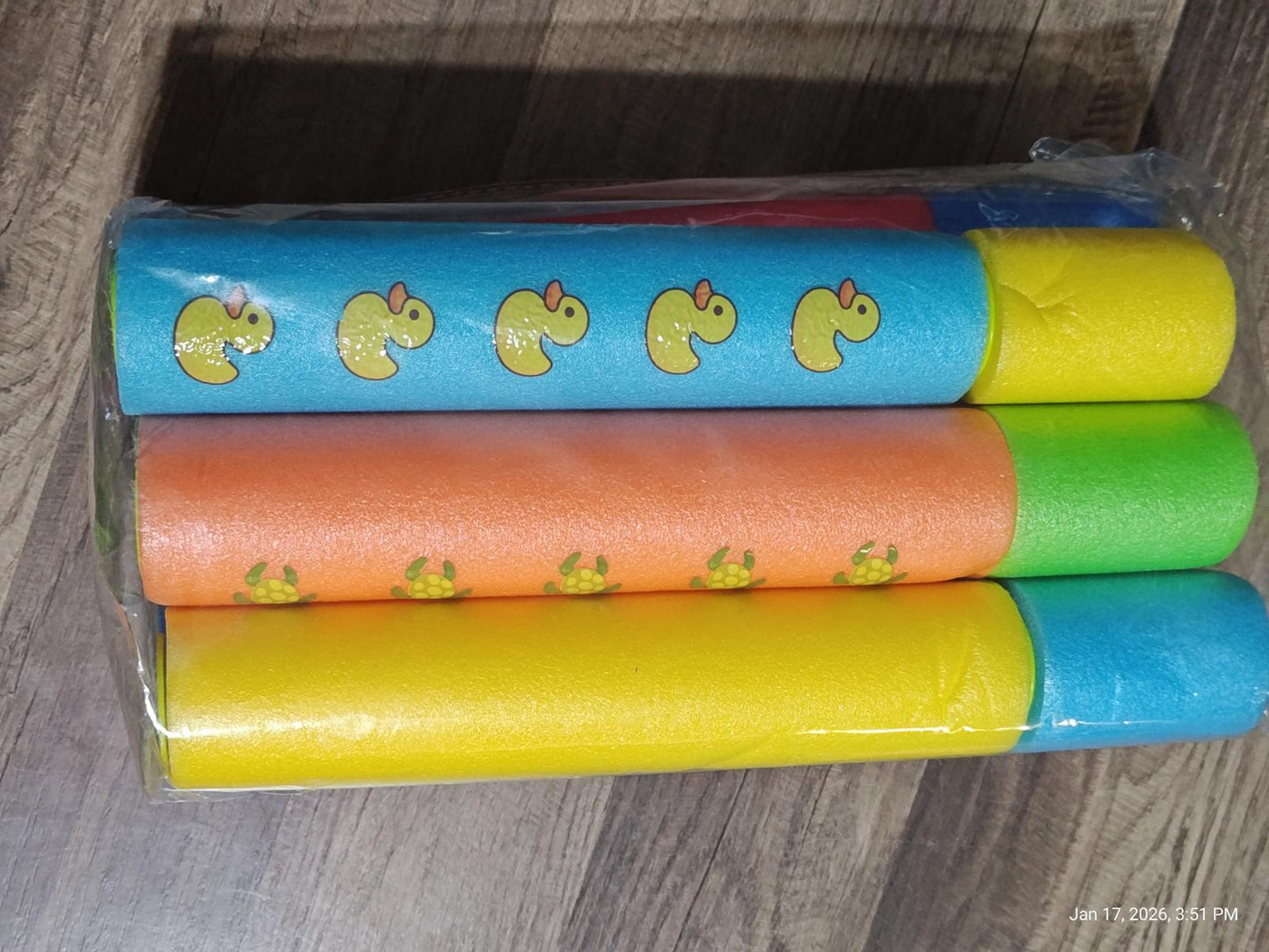 Rubber Duck Party Streamers in vibrant colors including blue, orange, yellow, and green.