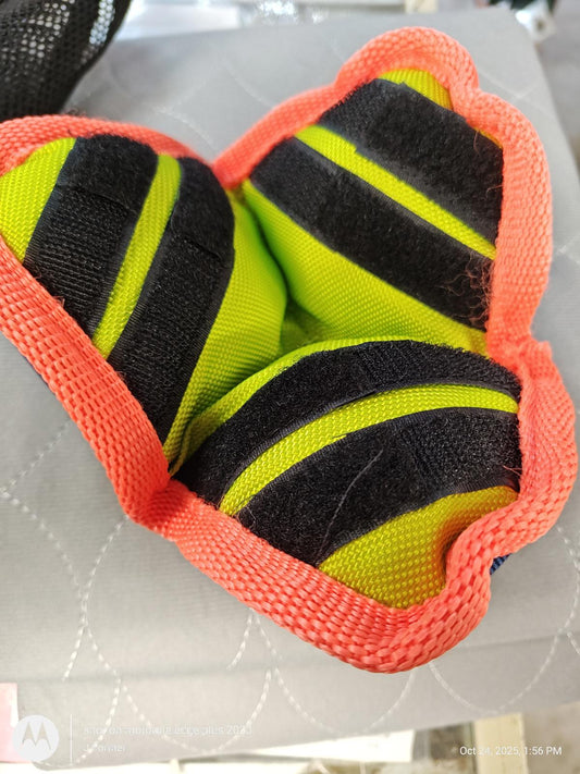 Safety knee pads with bright yellow and black stripes, featuring a durable red border.