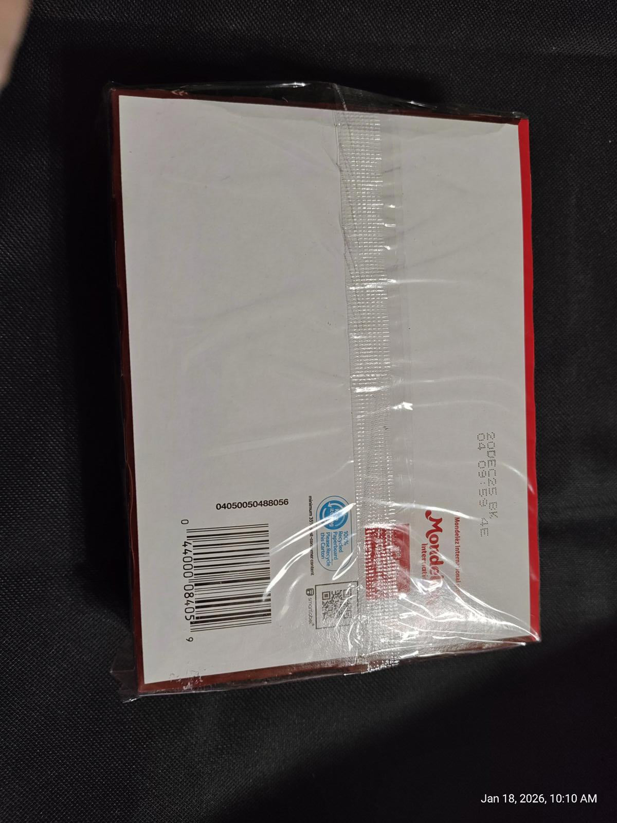 Product packaging for a sealed item with a barcode and clear plastic wrap.