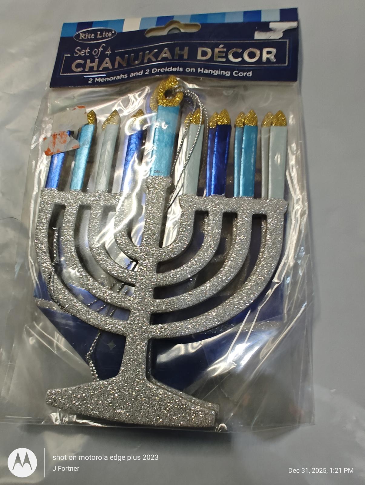 Set of Chanukah Décor featuring a silver menorah and colorful candles for festive celebrations.