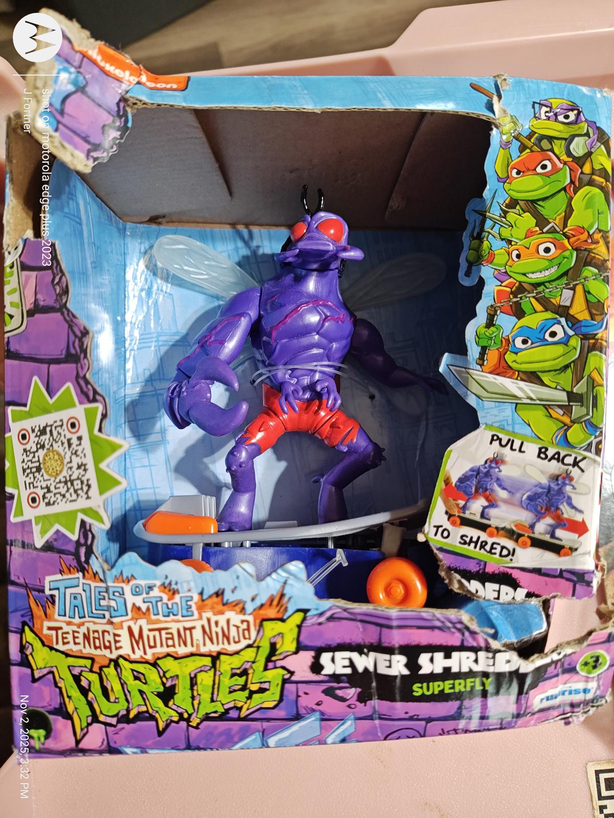 Sewer Shredder action figure from Teenage Mutant Ninja Turtles, featuring purple color and skateboard.