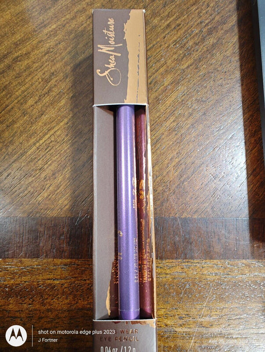 SheaMoisture lip liner set featuring a purple and a burgundy pencil in a stylish box.