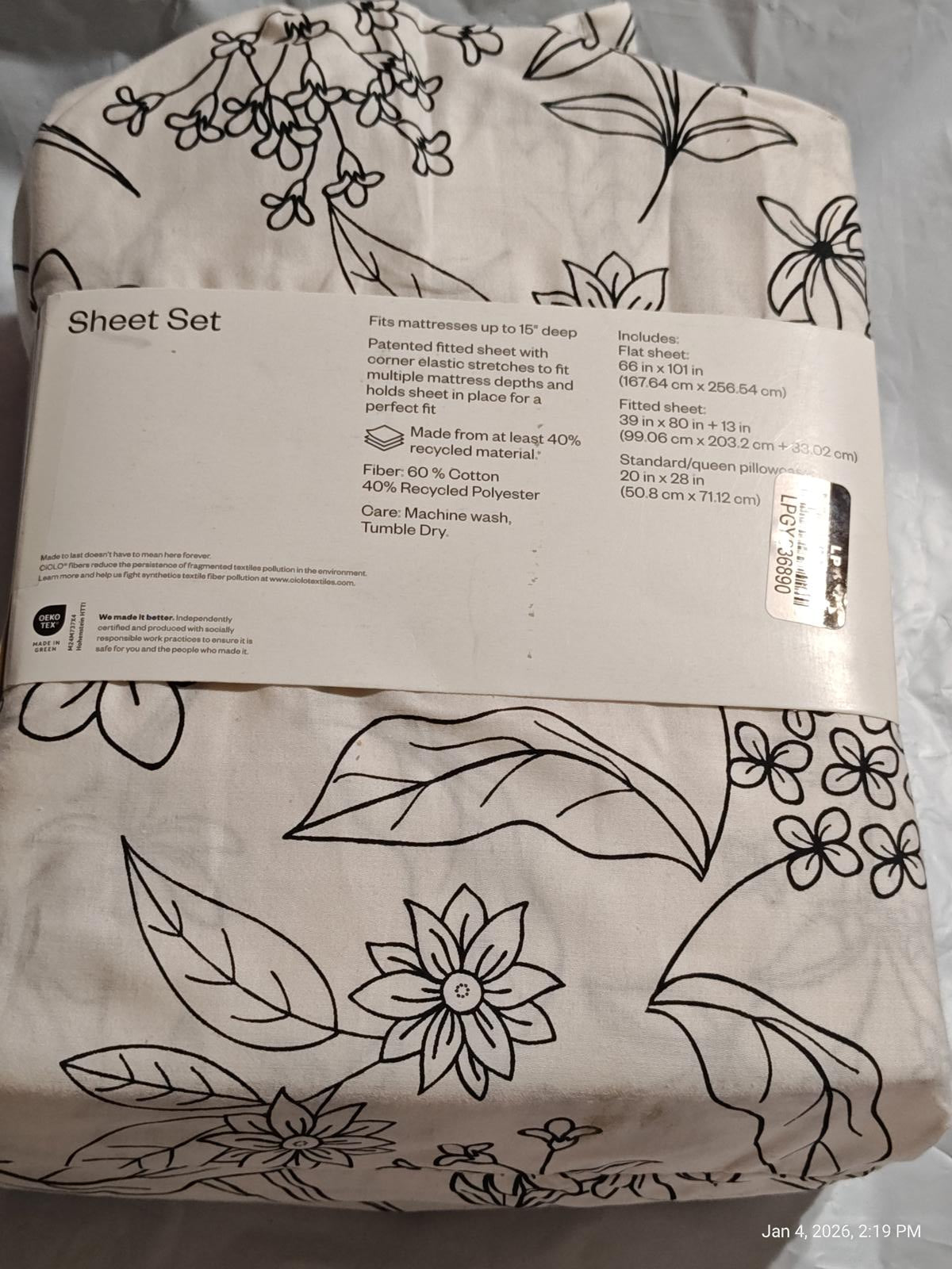 Sheet Set featuring floral patterns in black on a cream background.
