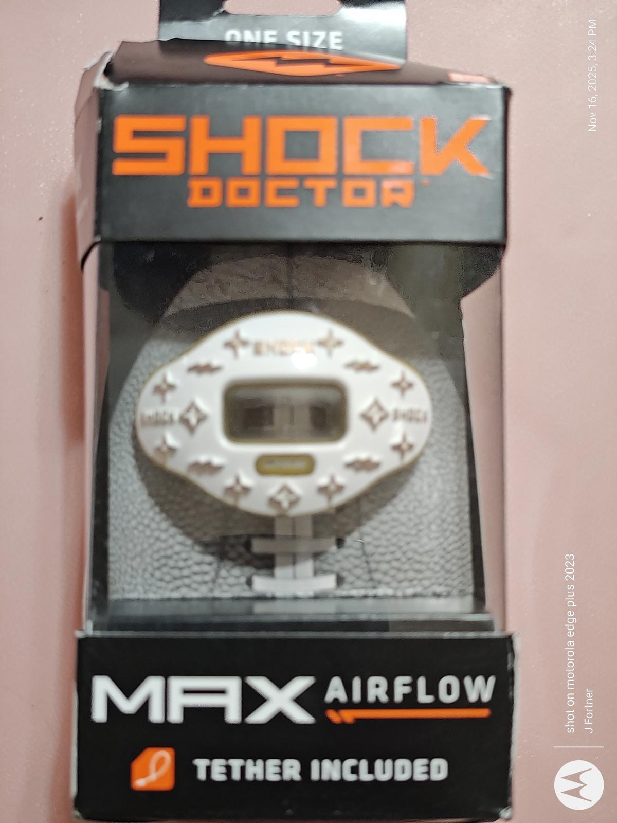 Shock Doctor Max Airflow mouthguard with tether included, featuring a sleek white design.