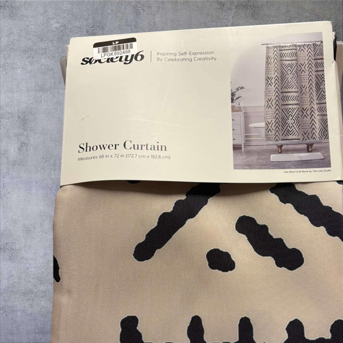 Shower Curtain featuring a modern design with black patterns on a beige background.