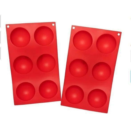 Silicone cake mold set featuring two red trays with six round cavities each.
