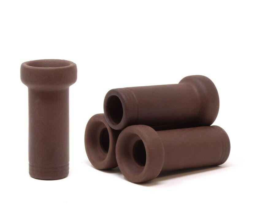 Silicone Brown Pipe Stoppers set, featuring four durable stoppers for sealing pipes securely.