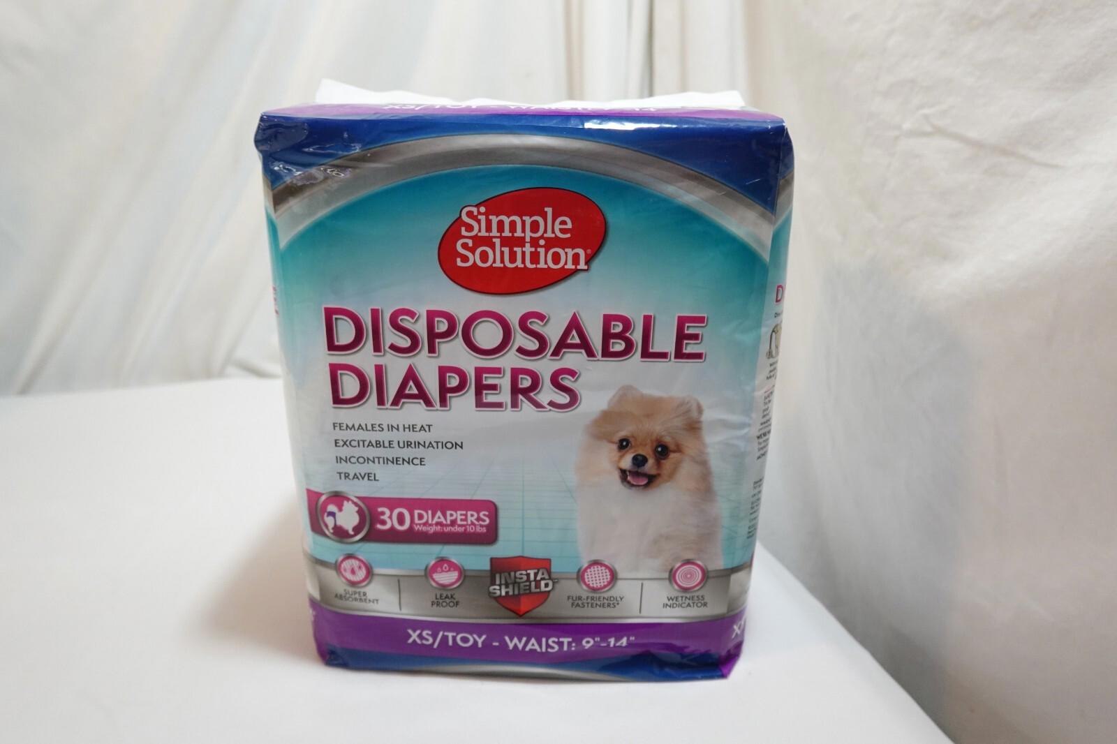 Simple Solution disposable diapers package featuring a cute dog on the front.