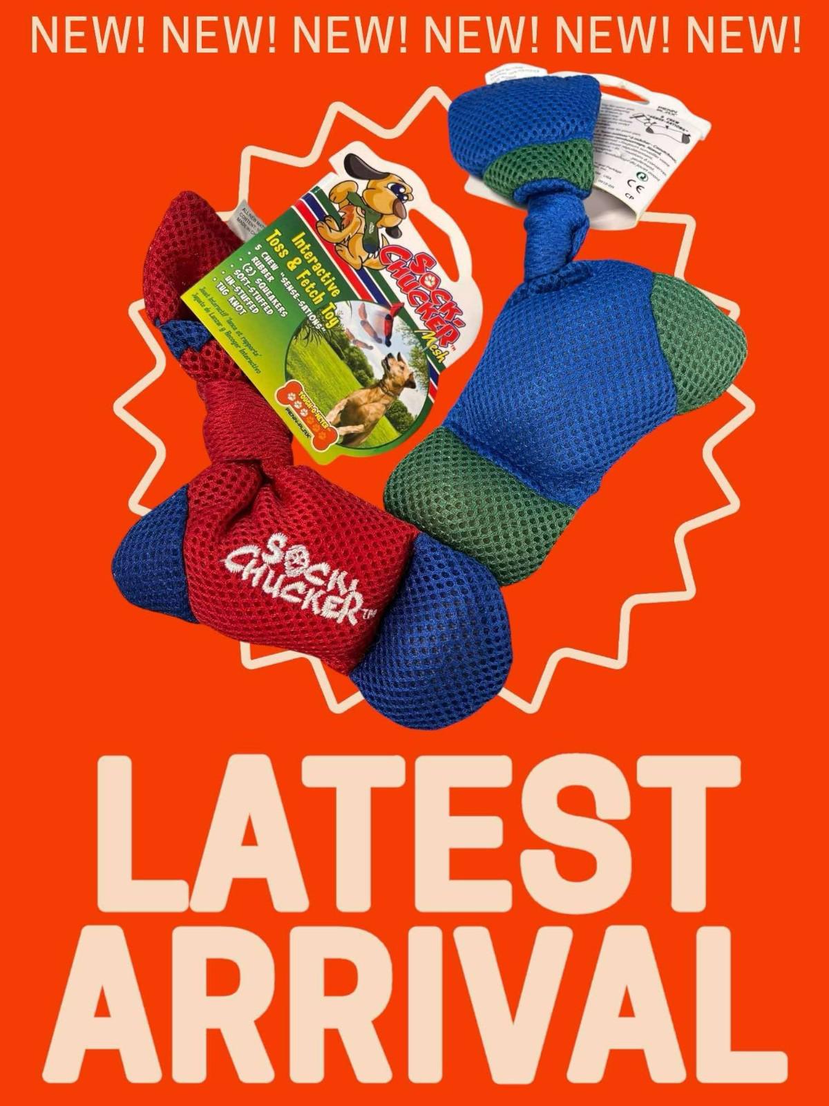 Sock Chucker dog toy in red and green colors, perfect for outdoor play.