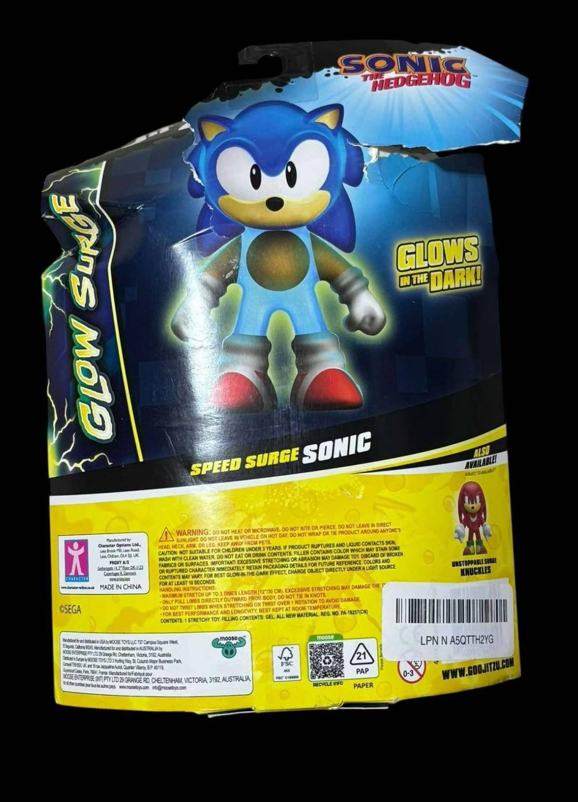 Speed Surge Sonic action figure glows in the dark, featuring vibrant blue colors and dynamic pose.