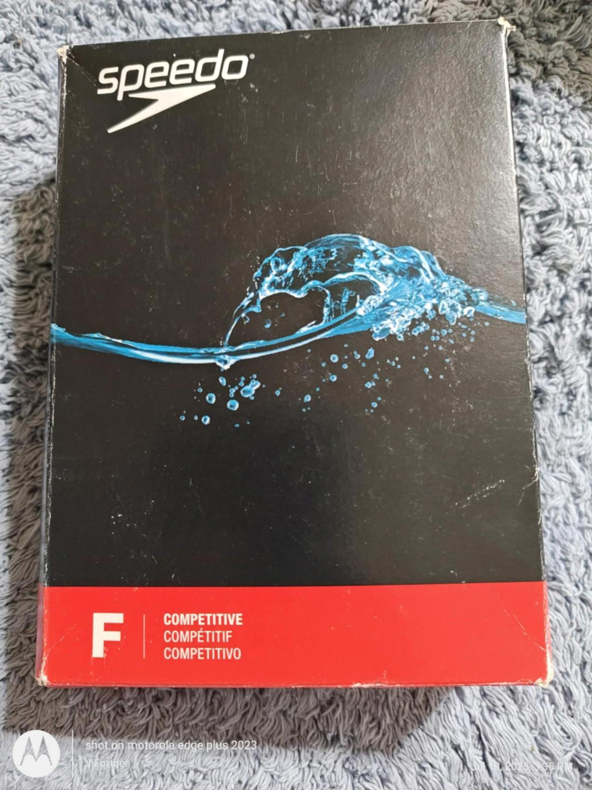 Speedo competitive swimwear box featuring a water splash design.