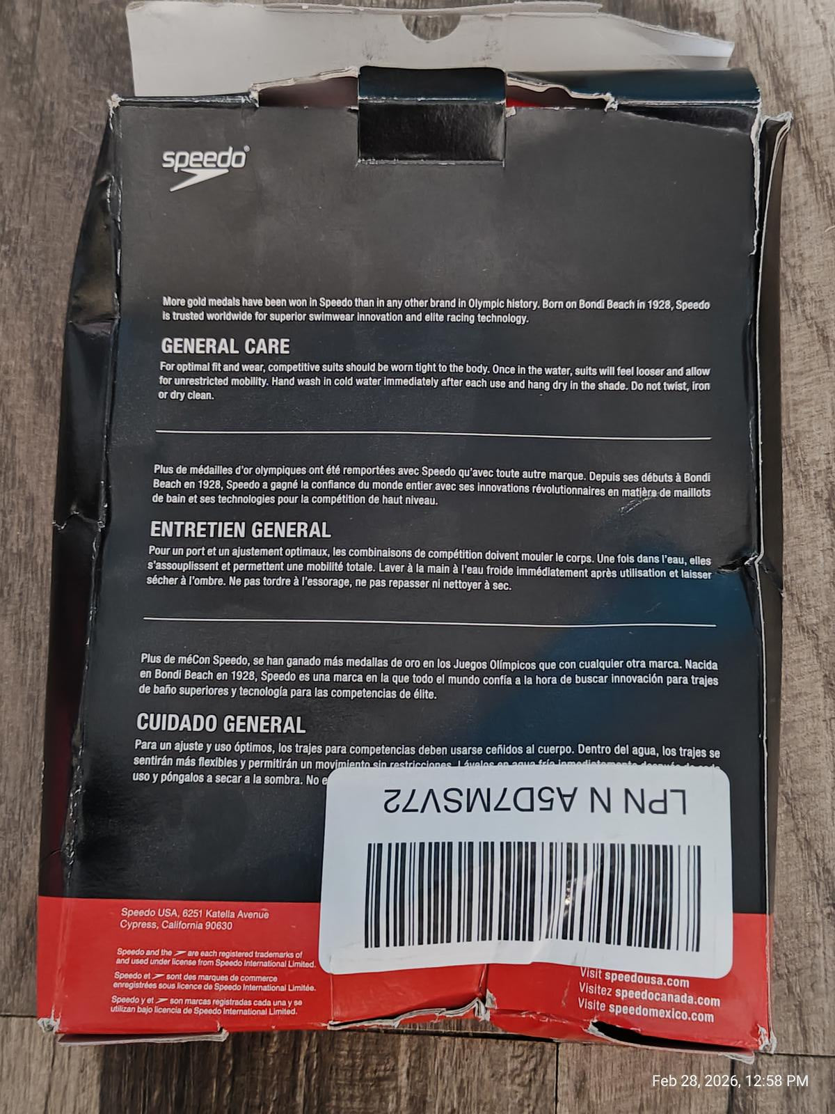 Speedo swimwear care instructions on packaging with barcode.