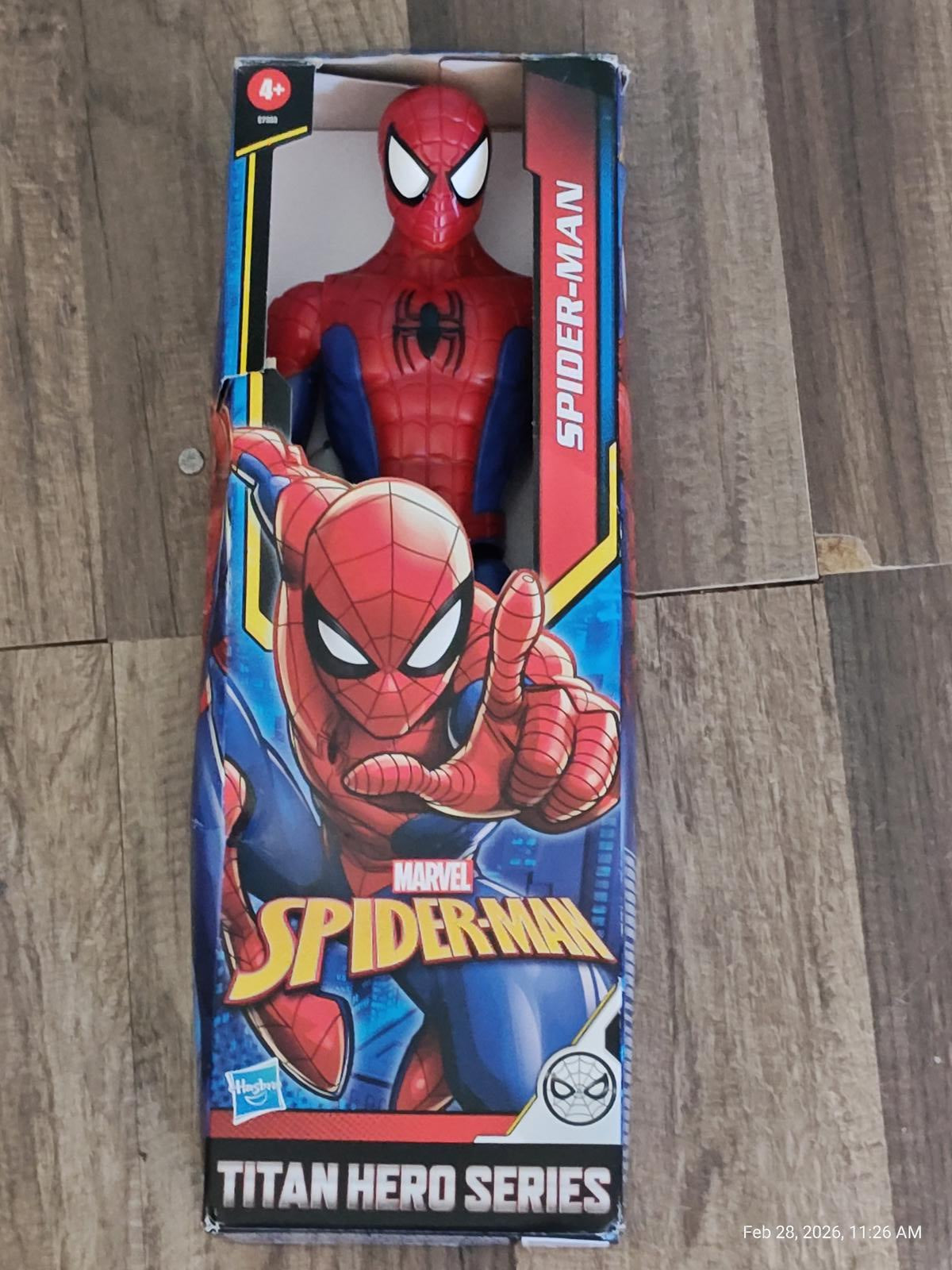 Spider-Man action figure from the Titan Hero Series, featuring vibrant colors and detailed design.