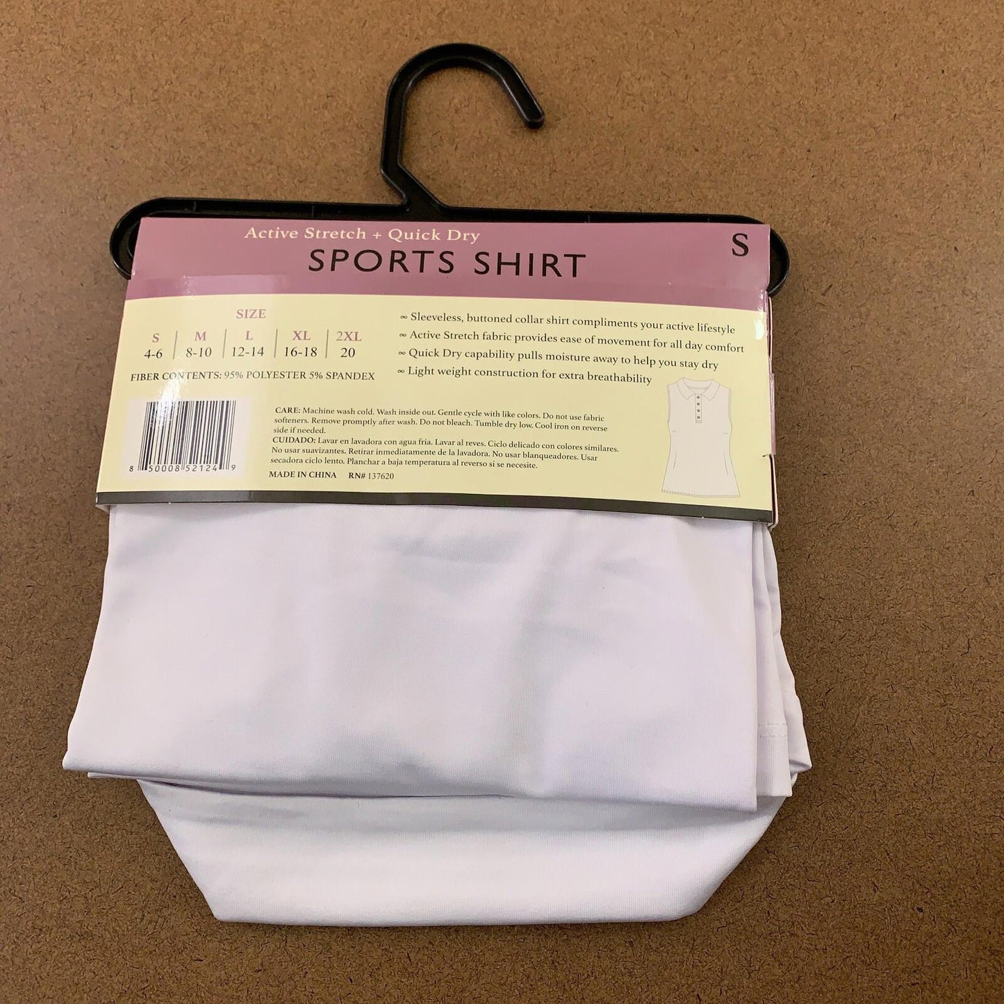 Sports shirt in white packaging, showcasing size and care instructions.
