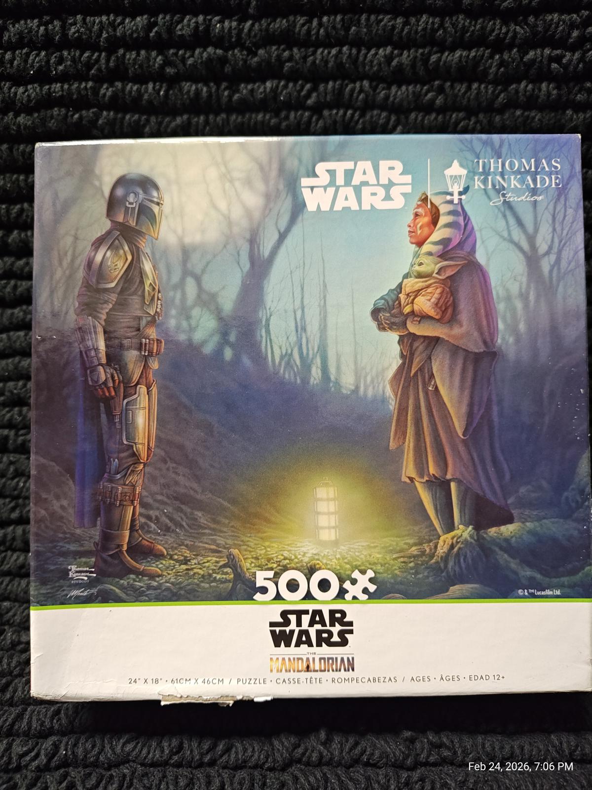 Star Wars 500-piece puzzle featuring a scene with a Mandalorian and a character in a cloak.