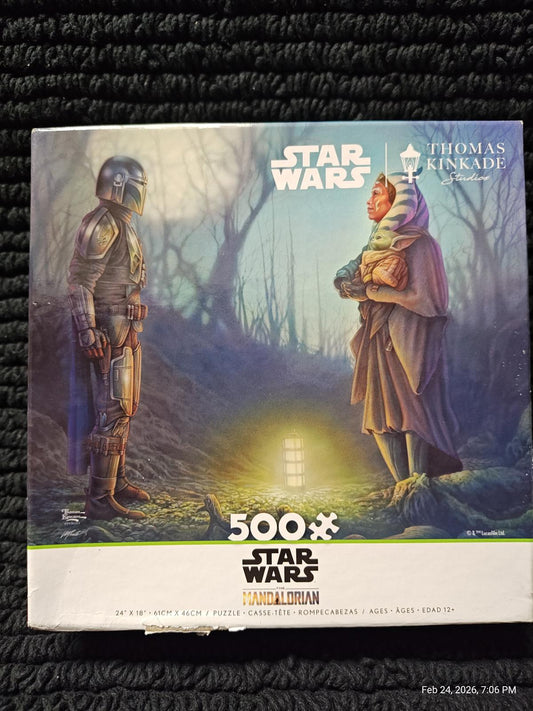 Star Wars 500-piece puzzle featuring a scene with a Mandalorian and a character in a cloak.