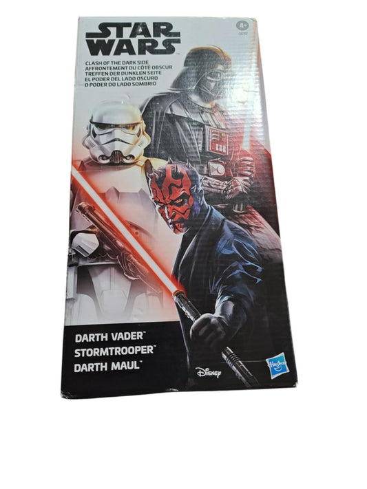 Star Wars action figures featuring Darth Vader, Stormtrooper, and Darth Maul with lightsabers.