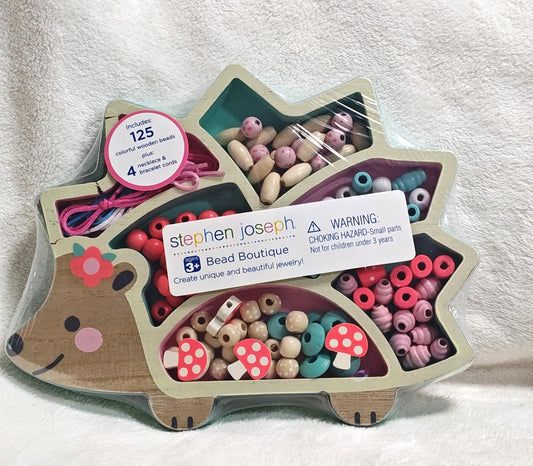 Stephen Joseph Bead Boutique set featuring 125 colorful beads in a hedgehog-shaped container.