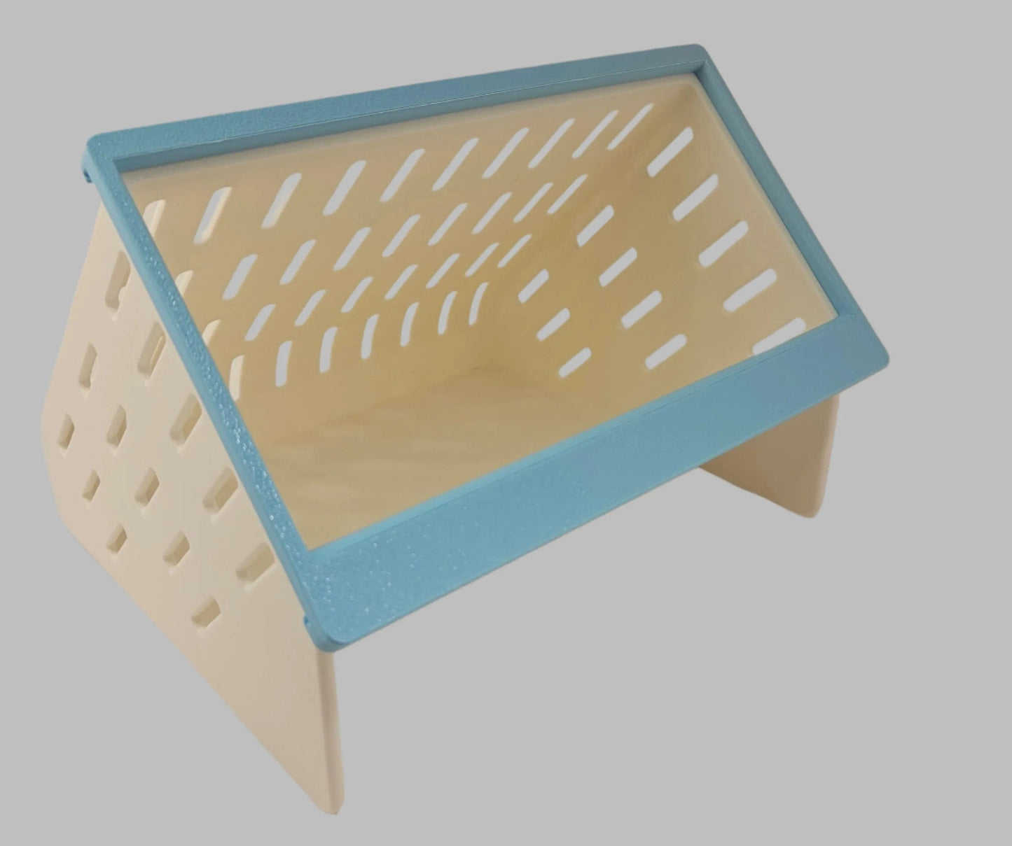 Storage organizer with a blue frame and beige body, featuring perforated design for ventilation.