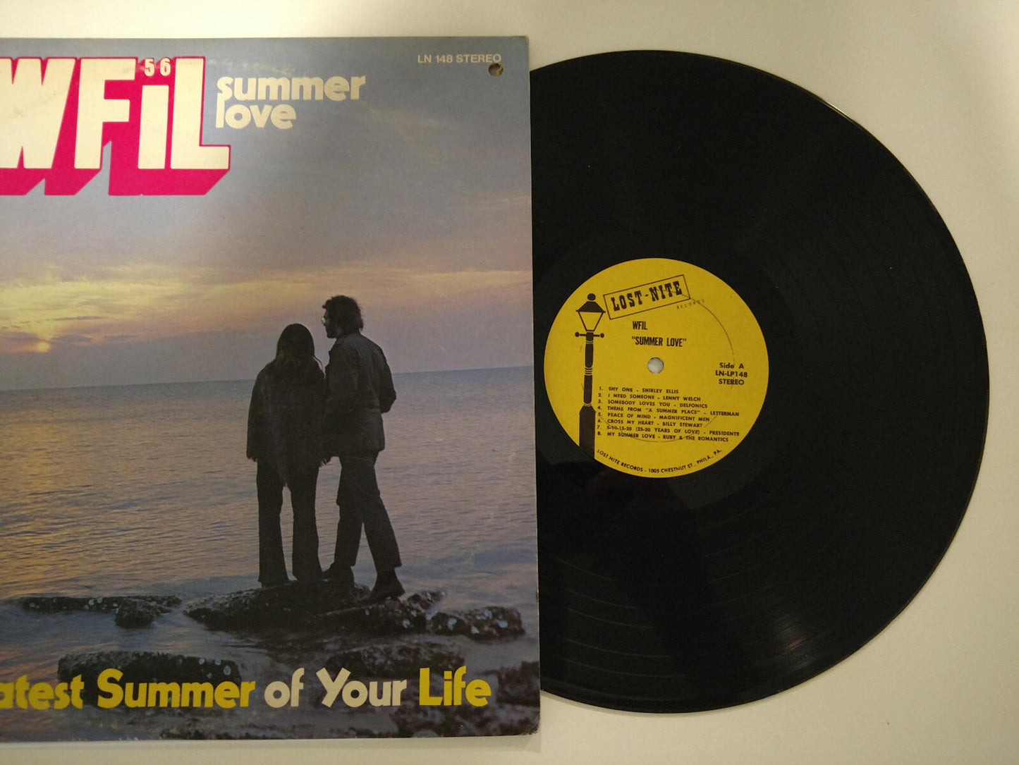 Summer Love vinyl record featuring the album cover with a sunset and two figures by the water.