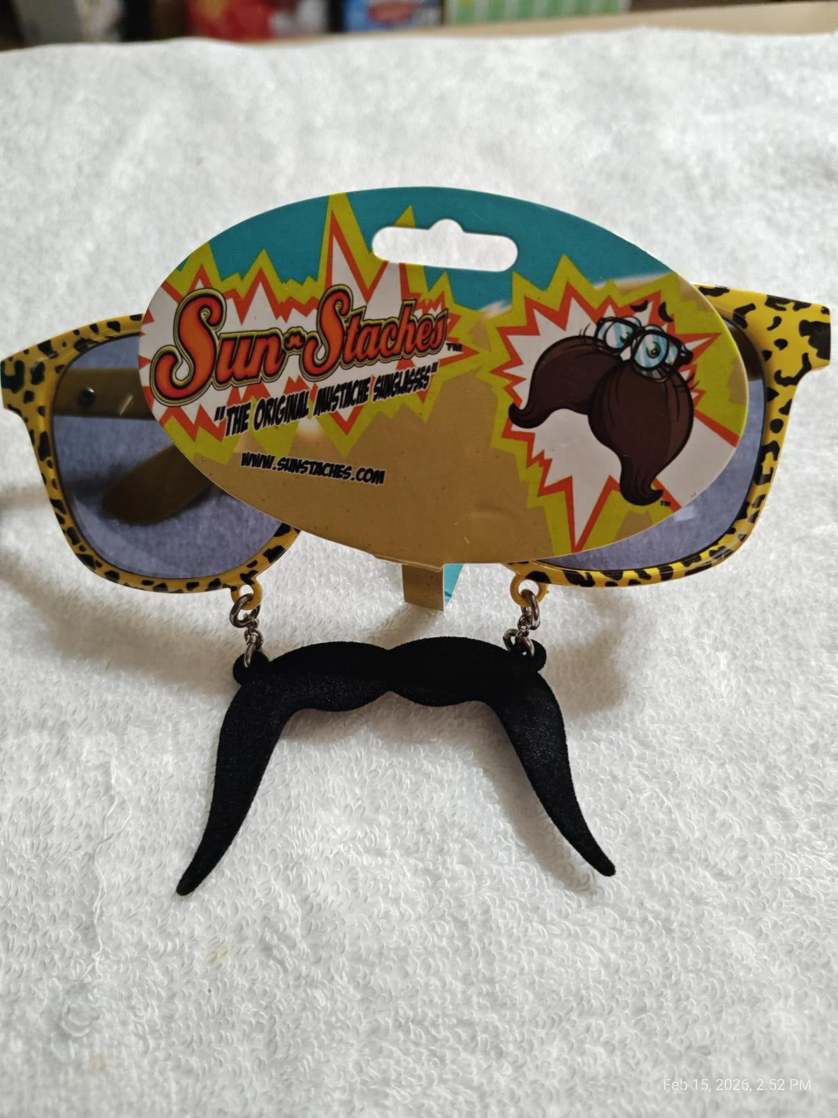 Sun-Staches sunglasses featuring a fun black mustache design and leopard print frames.
