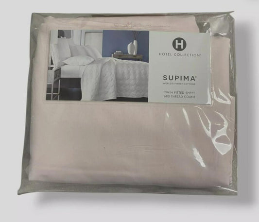 Supima sheets set in soft pink color, packaged neatly for retail display.