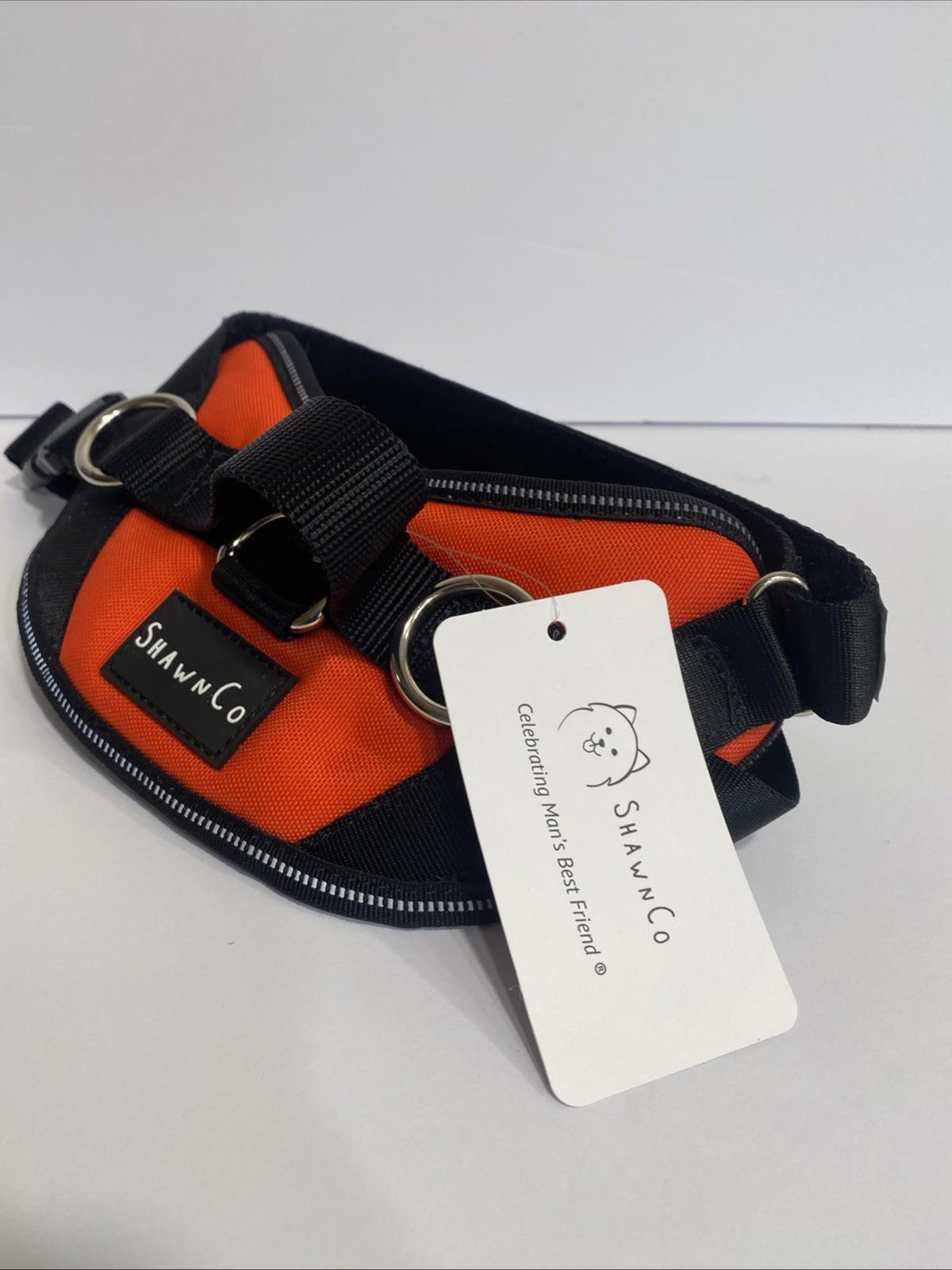 Swan Co. orange and black fanny pack with adjustable straps and tag.