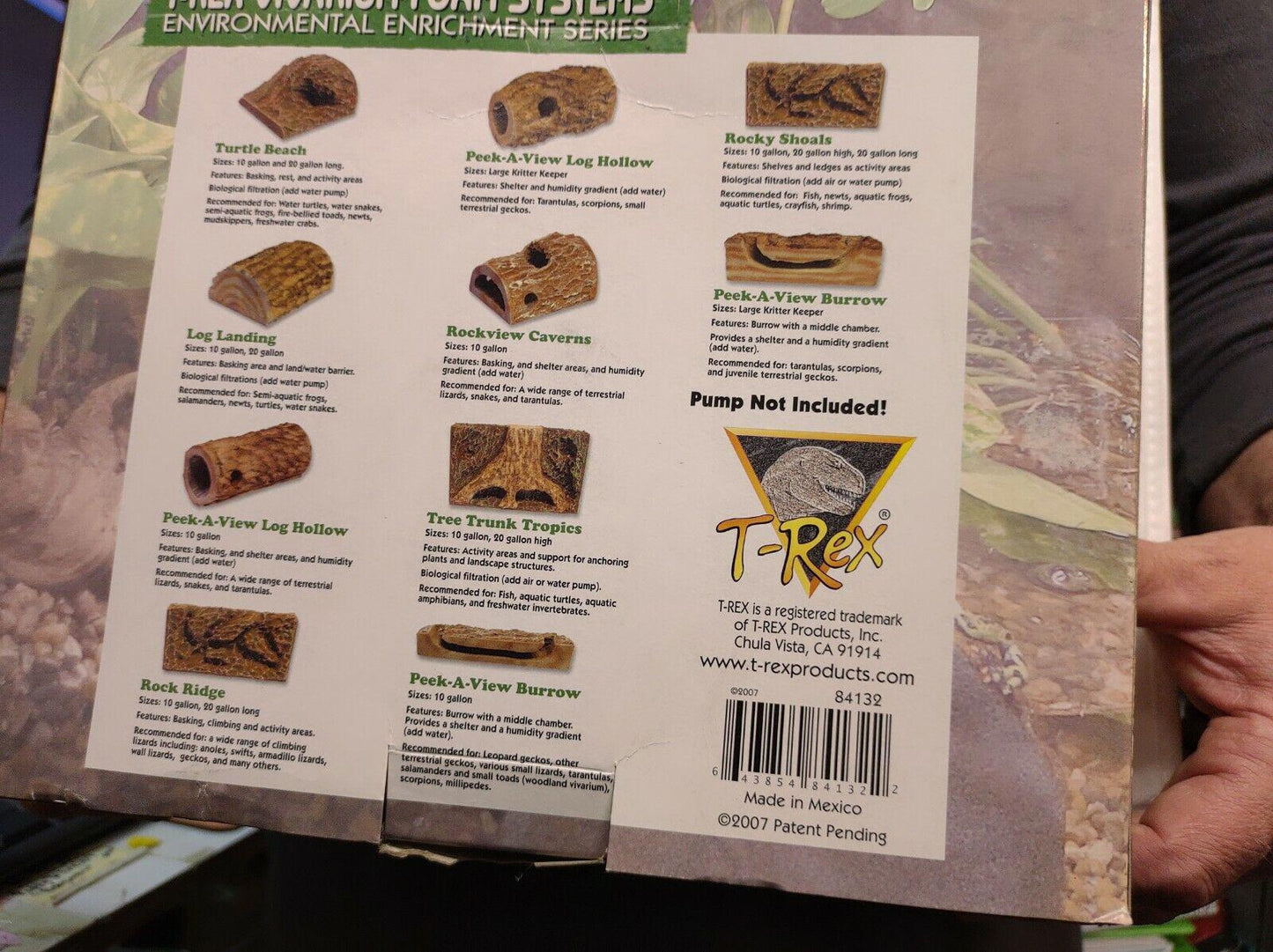 T-Rex environmental enrichment products for reptiles, featuring various log and rock shapes.