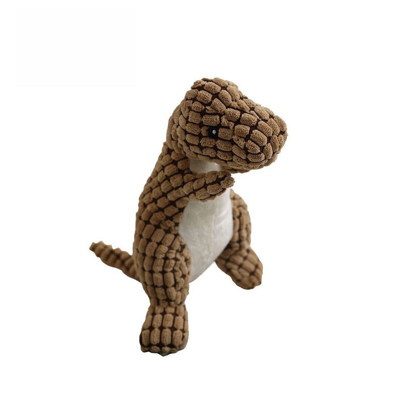 Brown dinosaur plush toy with textured fabric and a friendly expression.