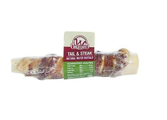 Tail & Steak natural beef rib bone for dogs, featuring a meaty texture and durable chew.
