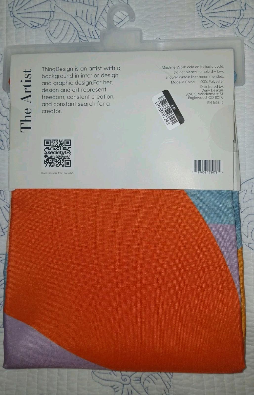 The Artist fabric featuring vibrant orange and pastel colors, ideal for creative projects.