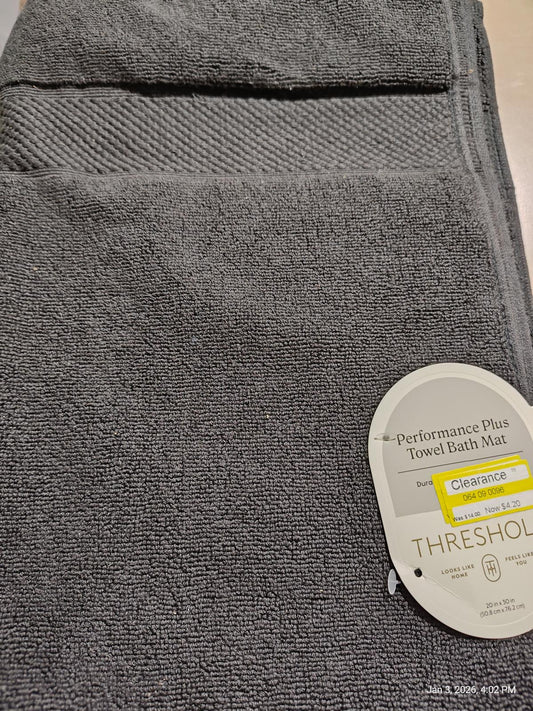 Threshold Performance Plus towel bath mat in dark gray color with textured design.