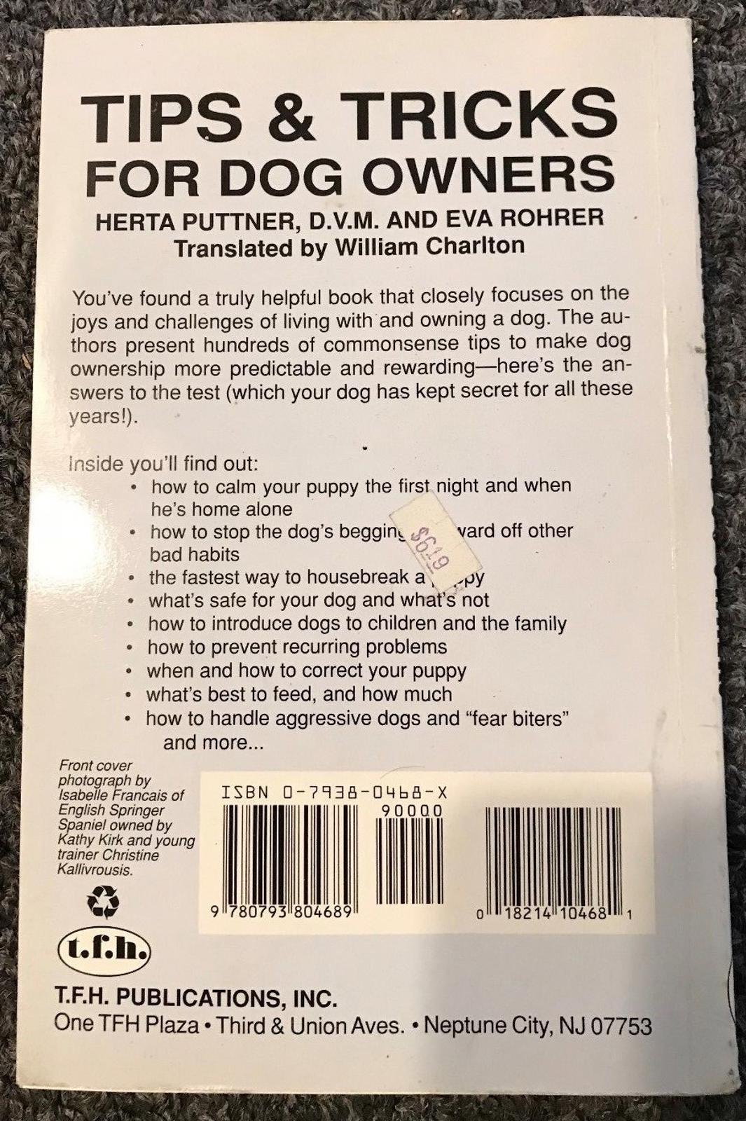 Tips & Tricks for Dog Owners book cover featuring helpful advice for dog care and training.