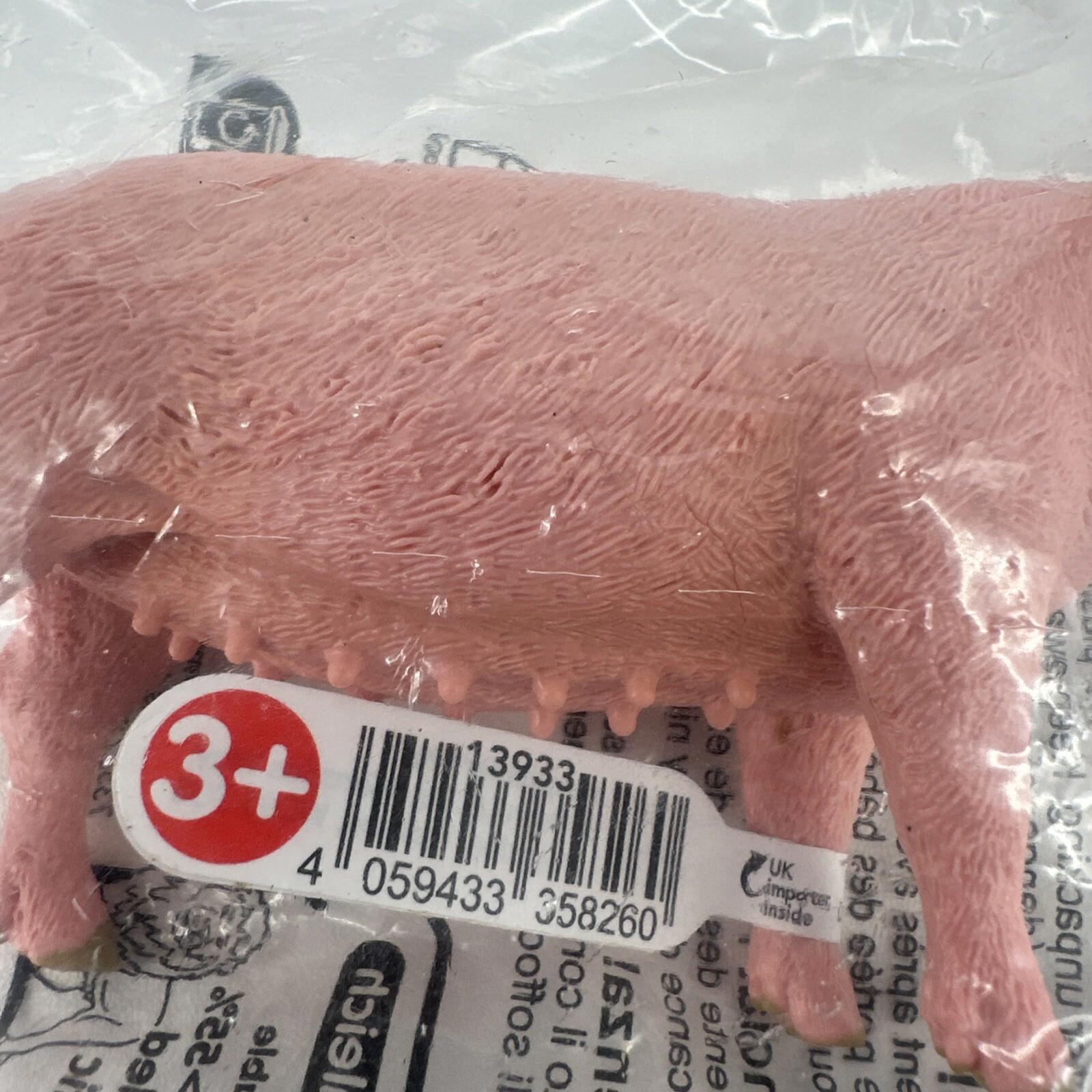 Toy pig figurine with detailed texture and pink color, suitable for ages 3 and up.