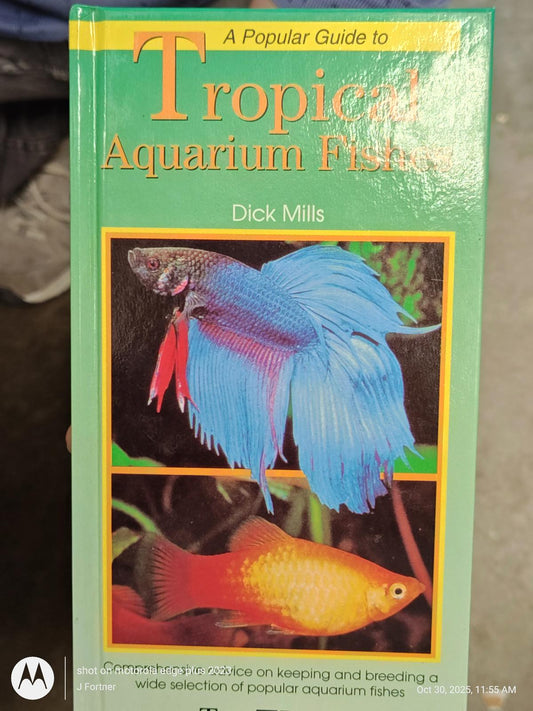 Tropical Aquarium Fish book cover featuring colorful fish illustrations and informative text.