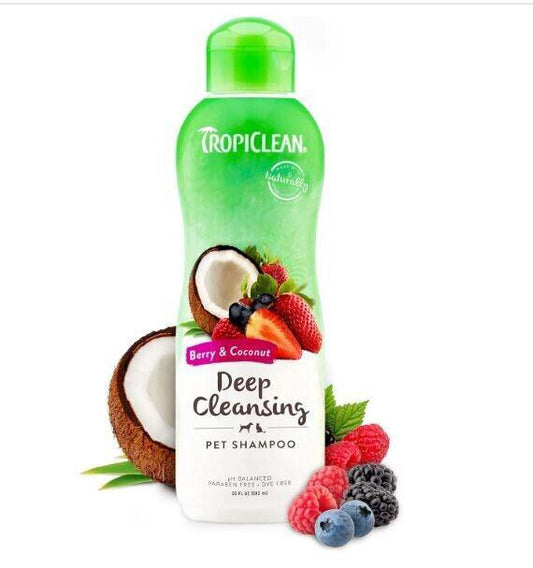 TropiClean Deep Cleansing Pet Shampoo with berry and coconut scent, featuring a green bottle and coconut shell.