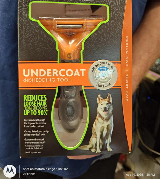 Undercoat deShedding Tool reduces loose hair from shedding up to 90%, ideal for medium dogs.