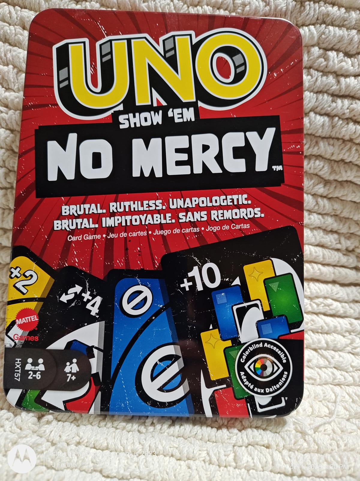 UNO Show 'Em No Mercy card game featuring brutal and ruthless gameplay for 2-6 players.