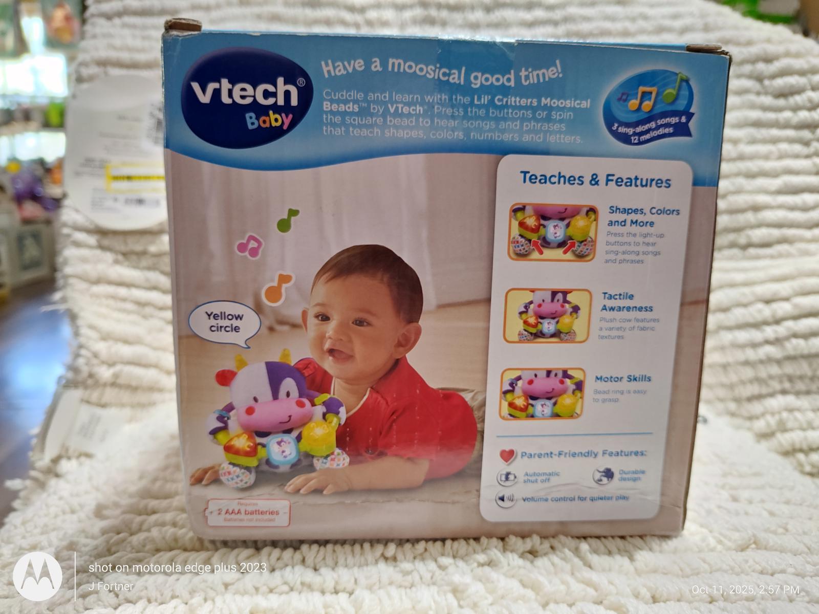 VTech Baby musical toy box featuring colorful animal characters and interactive sounds.