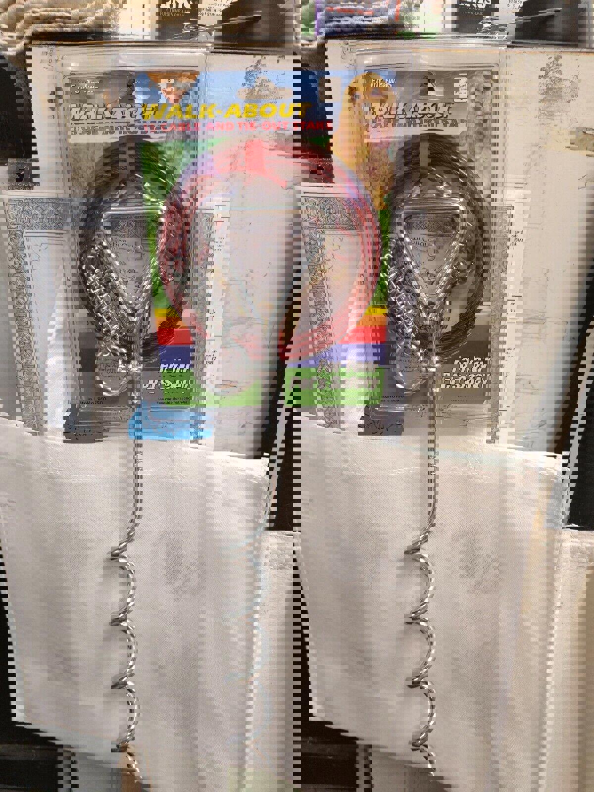 Walk About 15ft cable and tie-out stake for pets, featuring a durable metal spiral design.