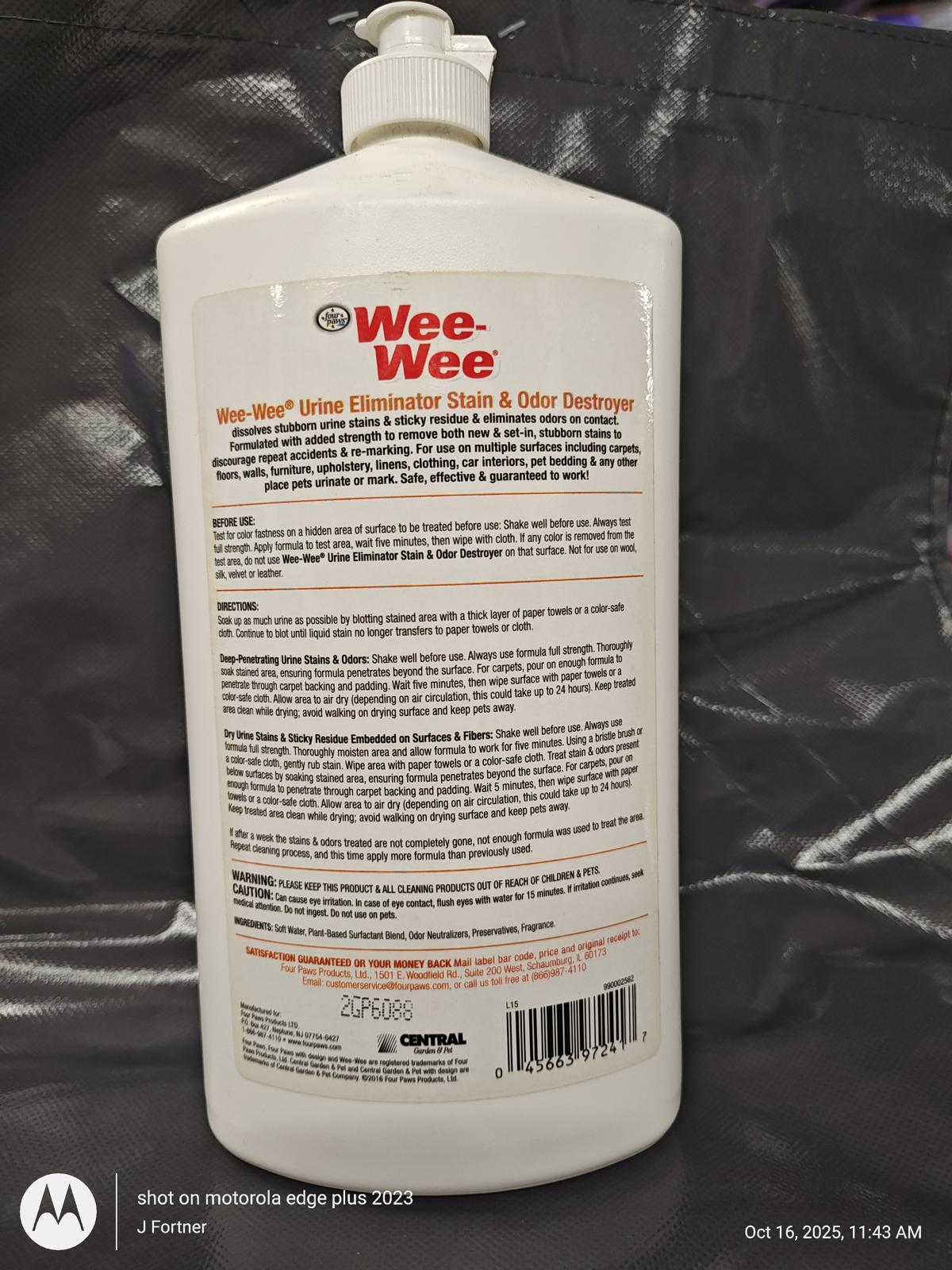 Wee-Wee urine eliminator stain and odor destroyer bottle with detailed instructions on the back.