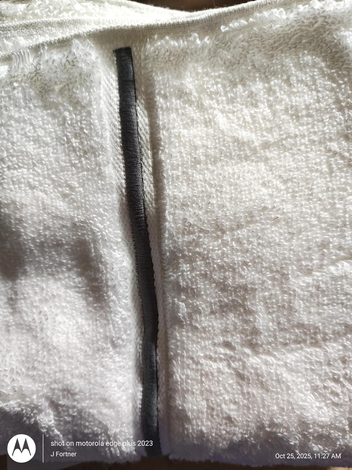 White Bathrobe with Soft Texture and Zipper Closure.